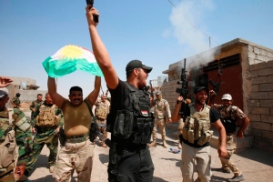 庫爾德部隊慶祝從伊斯蘭國恐怖分子手中奪回城鎮。（圖：路透社） <br/>