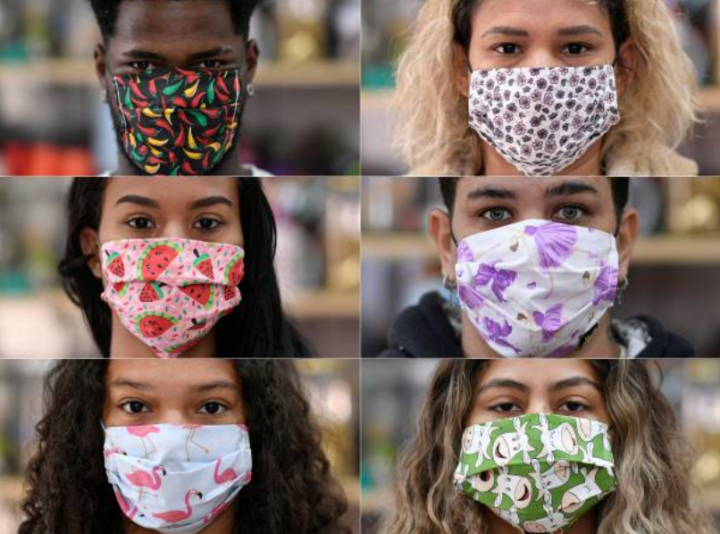 疫情期間各人帶上特色的口罩。（圖：Getty Images）